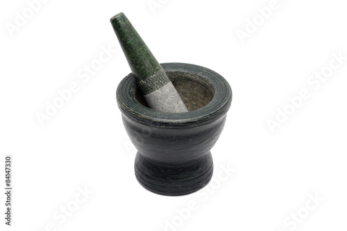 Granite mortar and pestle. Isolated on white background