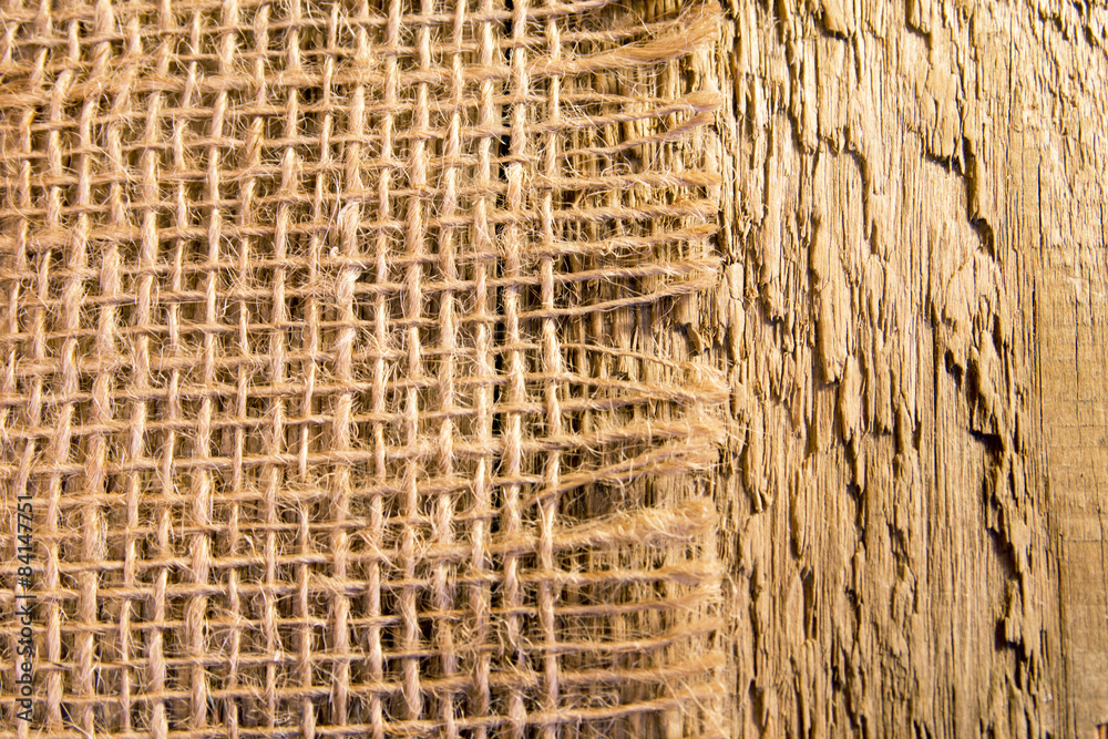 Burlap napkin on rustic wooden table Burlap napkin on rustic wooden table