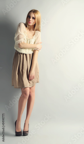 Expressive young model on gray background