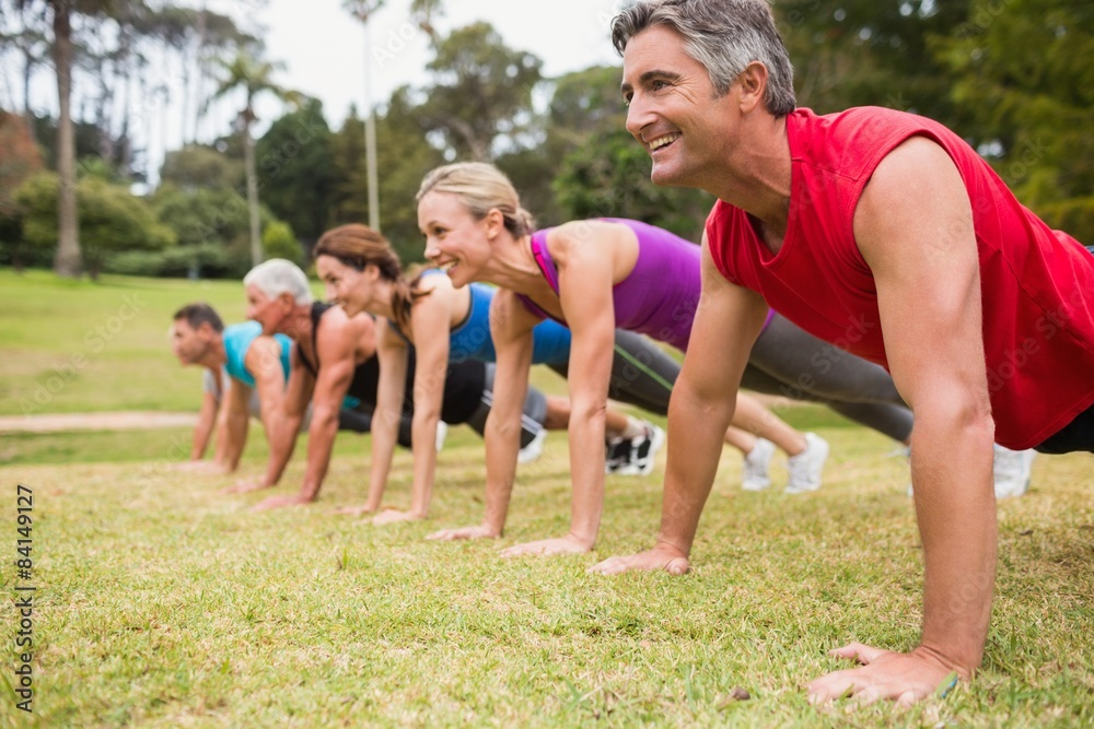 Fototapeta premium Happy athletic group training 
