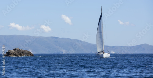 Sailboats participate in sailing regatta. Yachting. 