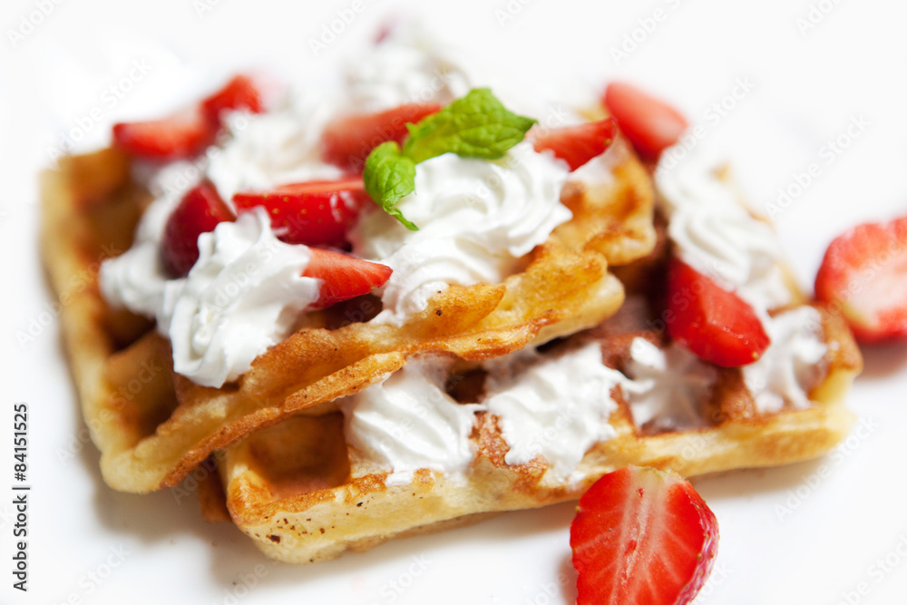 Breakfast - waffles with fresh berries and cream Breakfast - waffles with fresh berries and cream