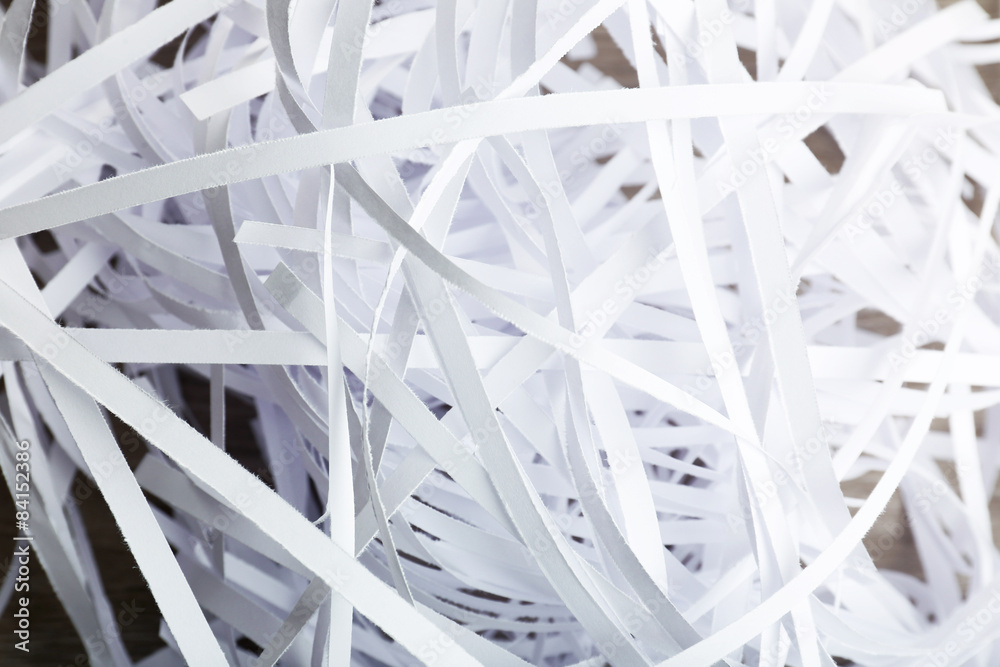Pile of paper strips from shredder, closeup Pile of paper strips from shredder, closeup