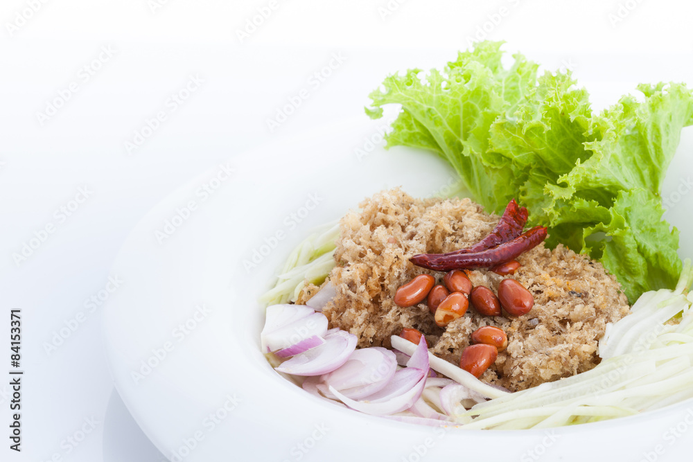 Crispy catfish salad on white dish