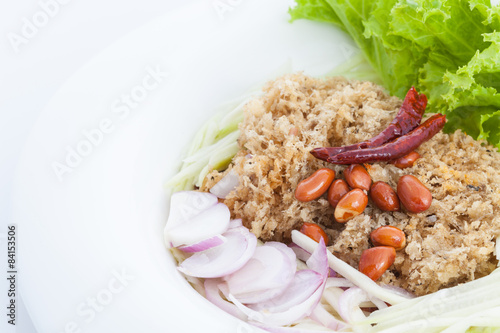 Crispy catfish salad on white dish