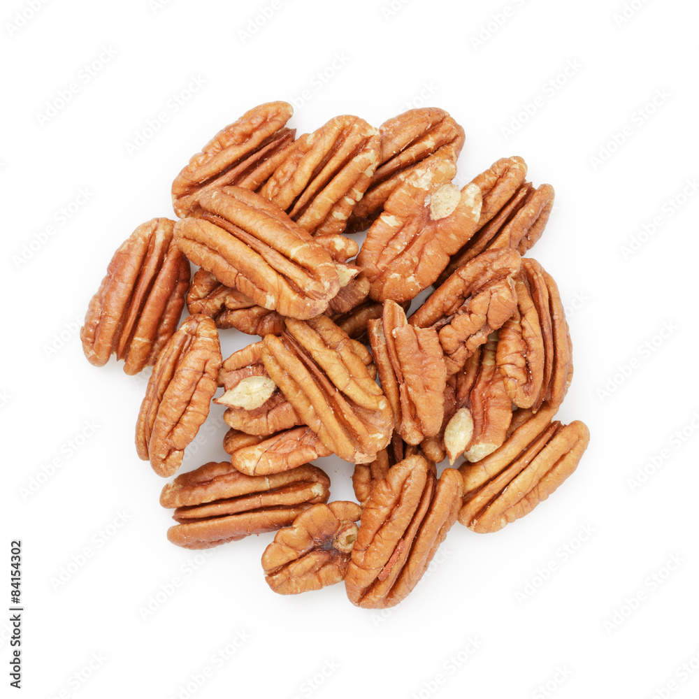 Pecan halves from above isolated on a white
