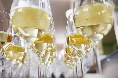glasses with Champagne on white table
