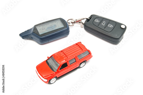red car and keys on white