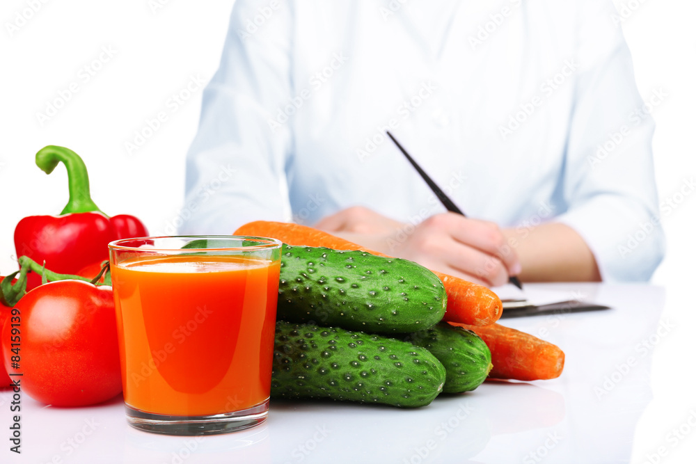Nutritionist doctor writing diet plan, isolated on white Nutritionist doctor writing diet plan, isolated on white
