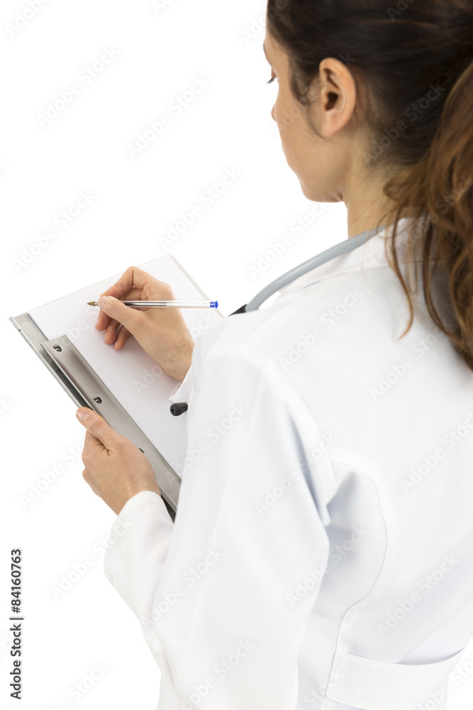 Female hospital working writing on a clipboard Female hospital working writing on a clipboard