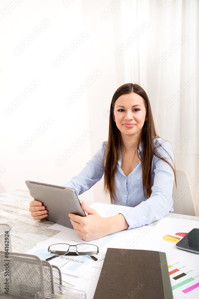 Working at the office with the tablet Working at the office with the tablet