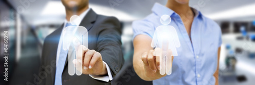 Man and woman using digital interface