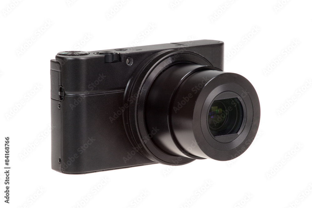 Digital compact camera with open lens isolated on white Digital compact camera with open lens isolated on white