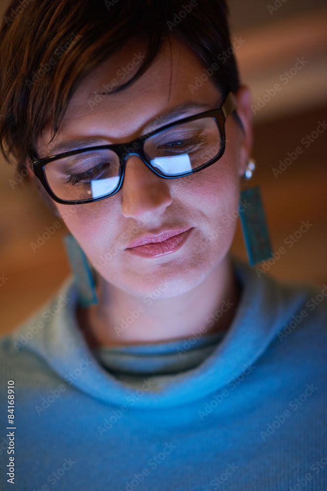 woman at home using tablet woman at home using tablet