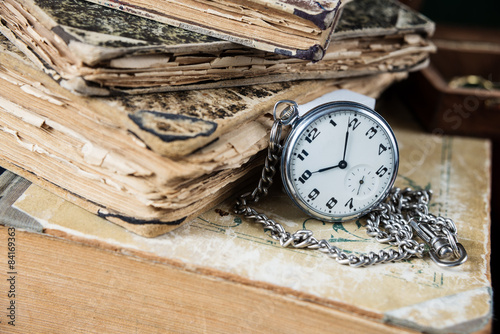Old books and  pocketwatch