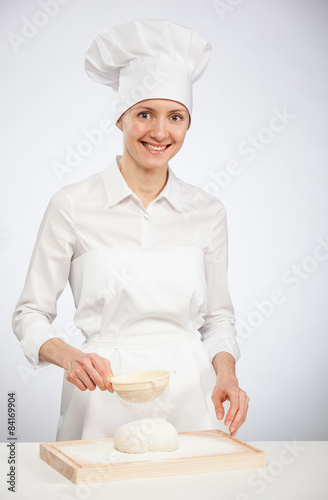 Beautiful young female cook photo