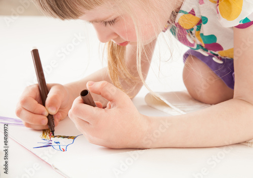 Little girl drawing photo