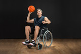Disabled Basketball Player Throwing Ball