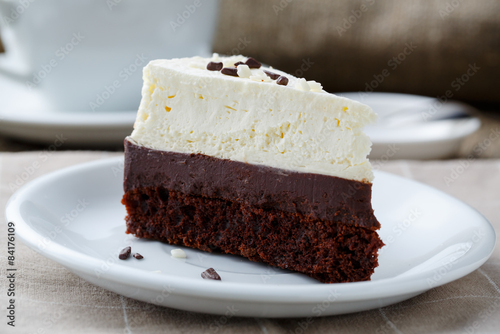 Vanilla cheesecake slice on wooden background. Vanilla cheesecake slice on wooden background.