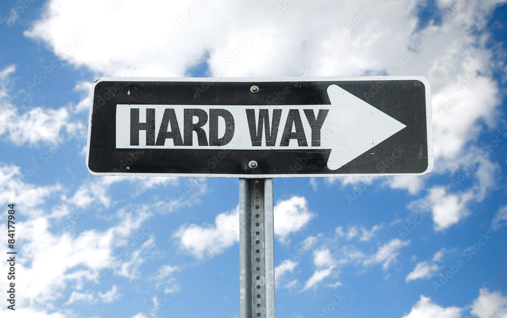 Hard Way direction sign with sky background Hard Way direction sign with sky background