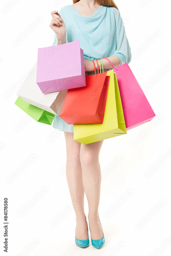 Young woman with shopping bags on white, clipping path Young woman with shopping bags on white, clipping path