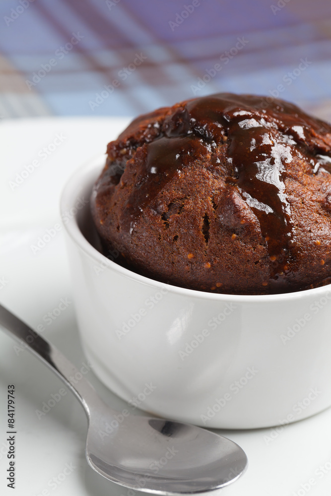 Fig pudding in a white ramekin. Fig pudding in a white ramekin.