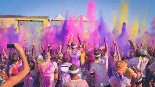 Celebrants dancing during the color Festival