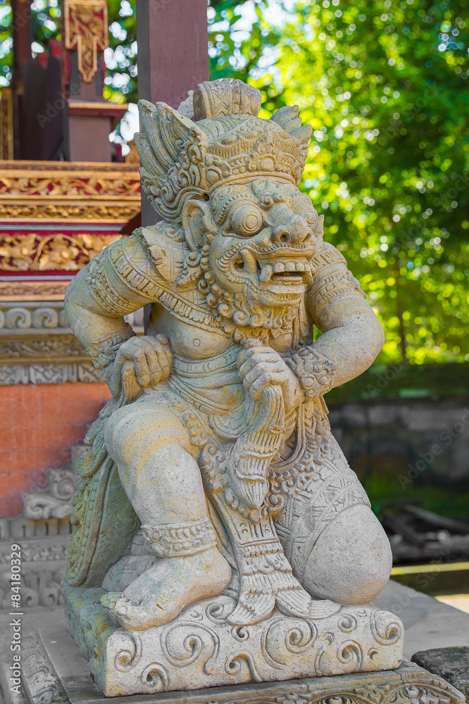 Balinese God statue in temple complex, Bali, Indonesia