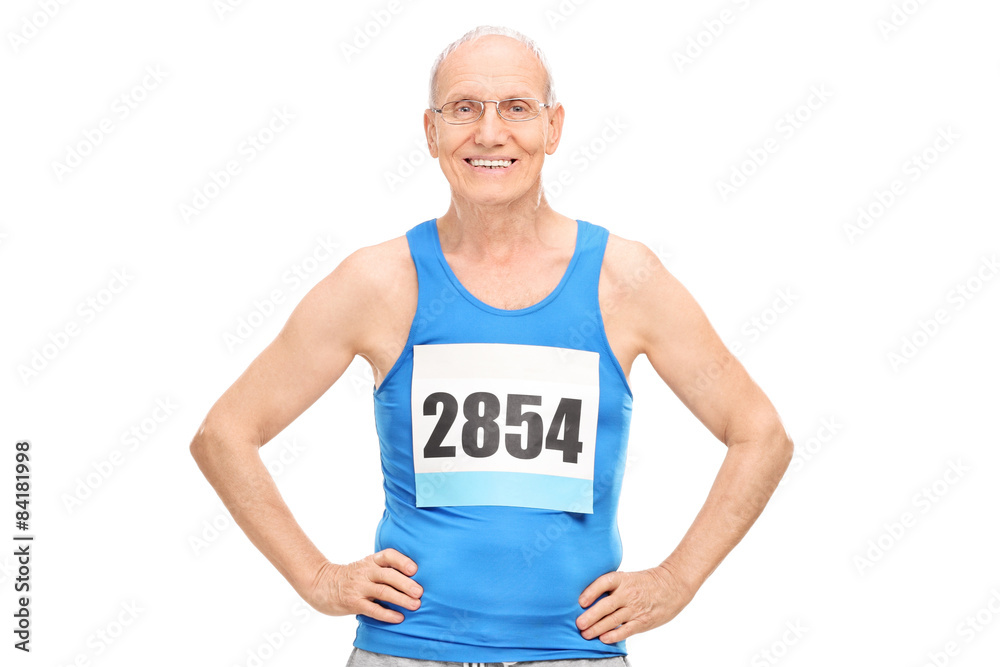 Senior man in sportswear smiling and looking at the camera