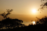 Early Morning Sunrise on Waimanalo Beach over Rock Island bursti