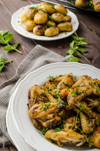 Roasted chicken wings with new potato