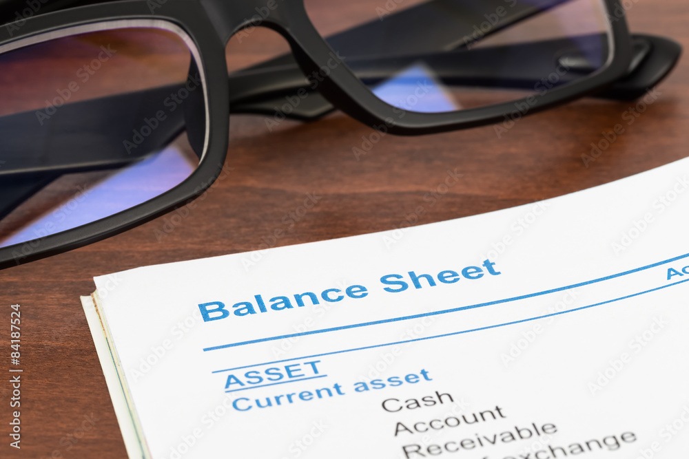 Balance sheet in stockholder report book, balance sheet is mock- Balance sheet in stockholder report book, balance sheet is mock-