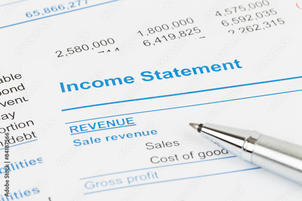 Income statement in stockholder report book; document are mock-u Income statement in stockholder report book; document are mock-u
