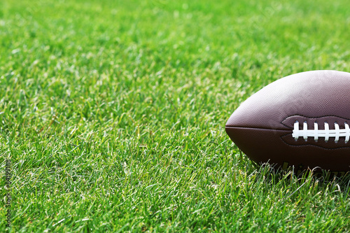 Rugby ball on green field