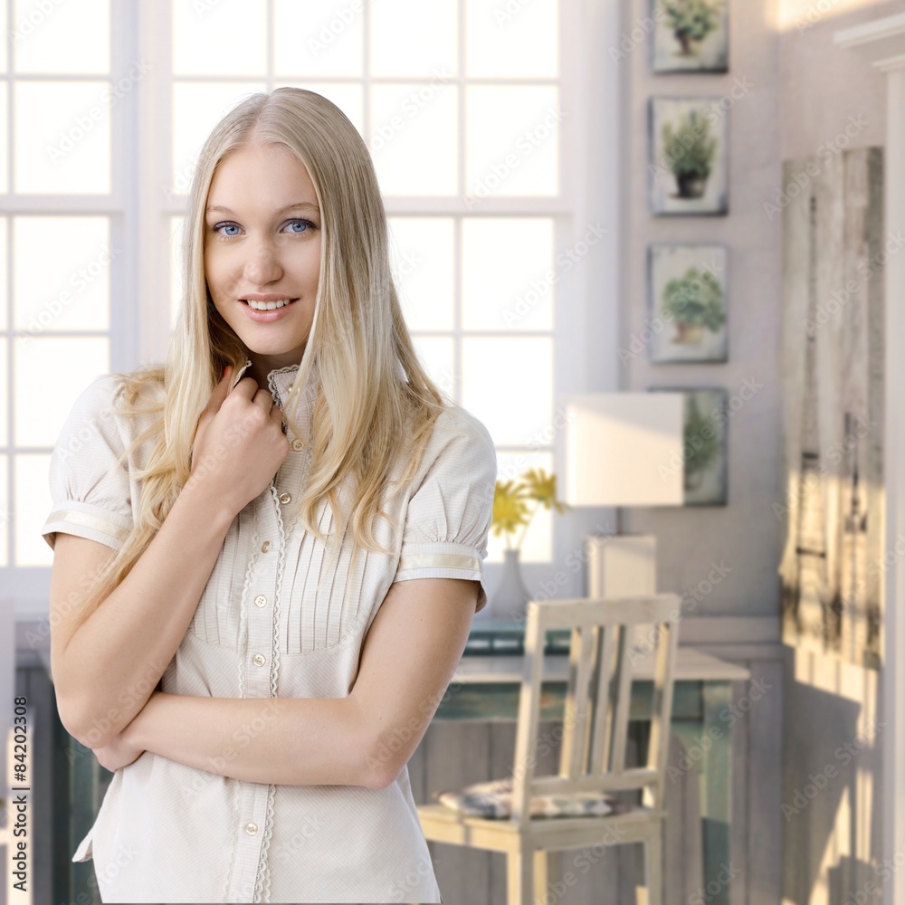 Attractive casual young blonde woman at retro home Attractive casual young blonde woman at retro home