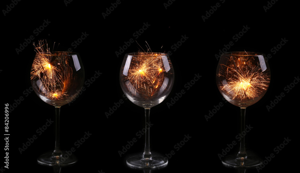 collage  Wine glass with a sparkler. In anticipation of New Year and Christmas