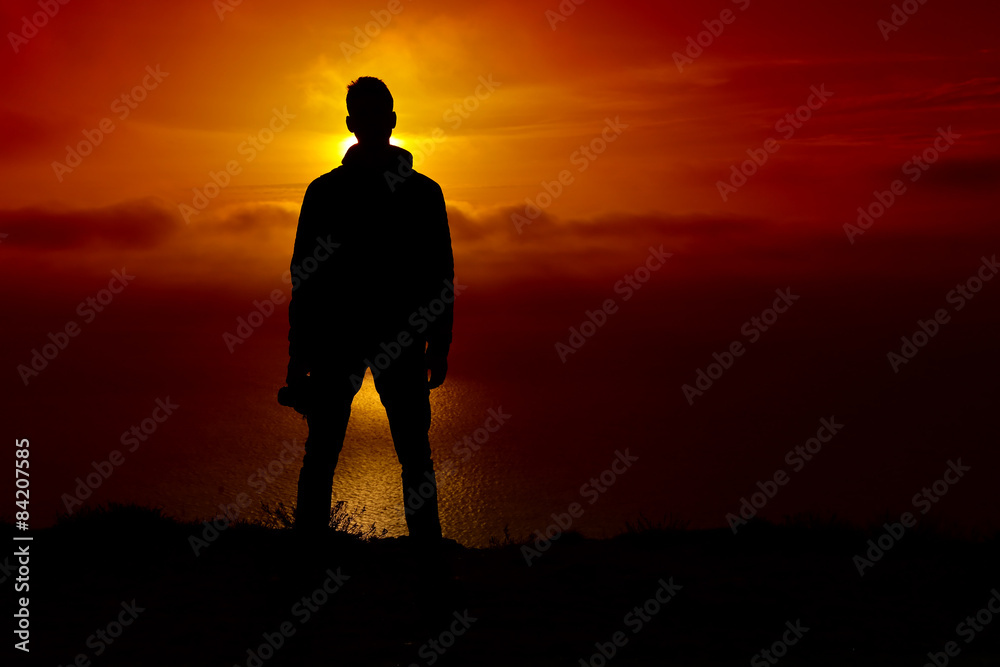 Silhouette of man on sunset. Element of design.
