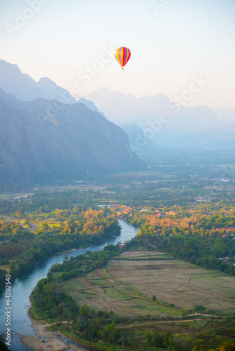 Fotografiet Colorful  hot air balloon in the sky.Laos.
