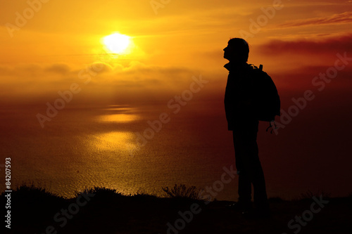 Silhouette of man on sunset. Element of design.