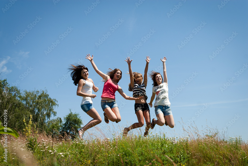 4 beautiful happy teen girls friends jumping 4 beautiful happy teen girls friends jumping
