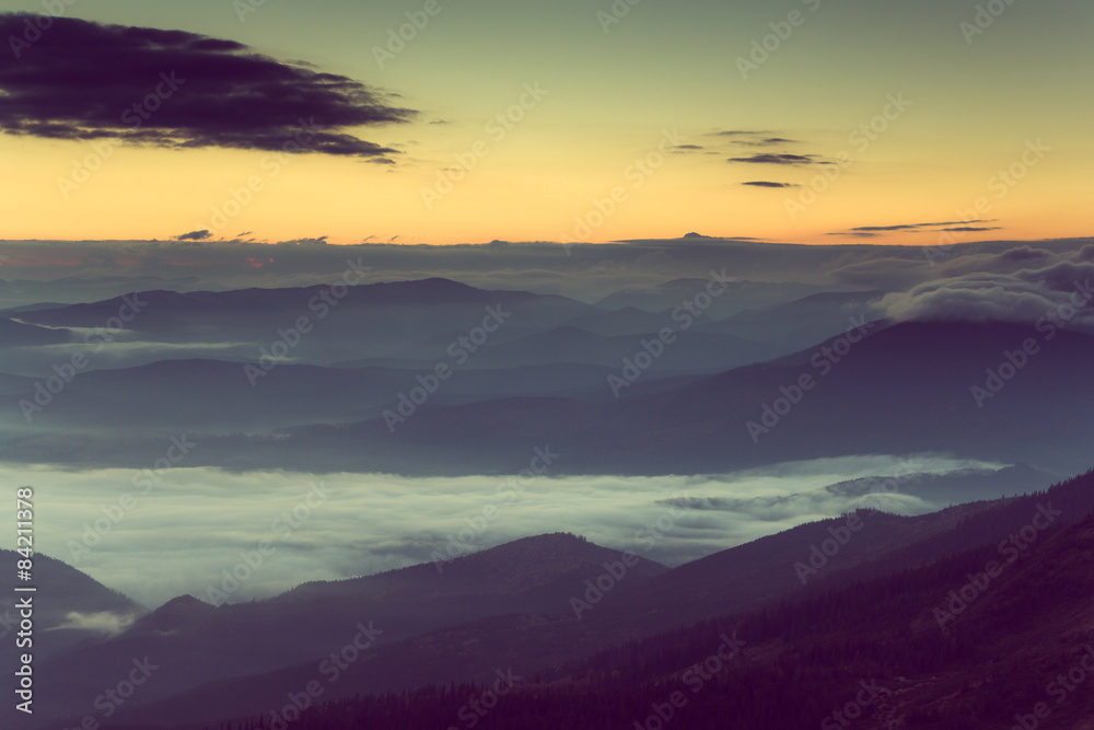 Beautiful foggy morning  in the mountains.