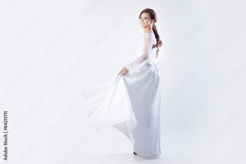 Beautiful bride in wedding dress, white background Beautiful bride in wedding dress, white background