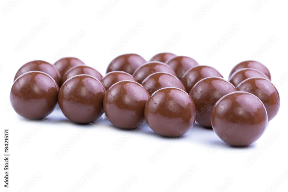 Chocolate candies on a white background. Chocolate candies on a white background.