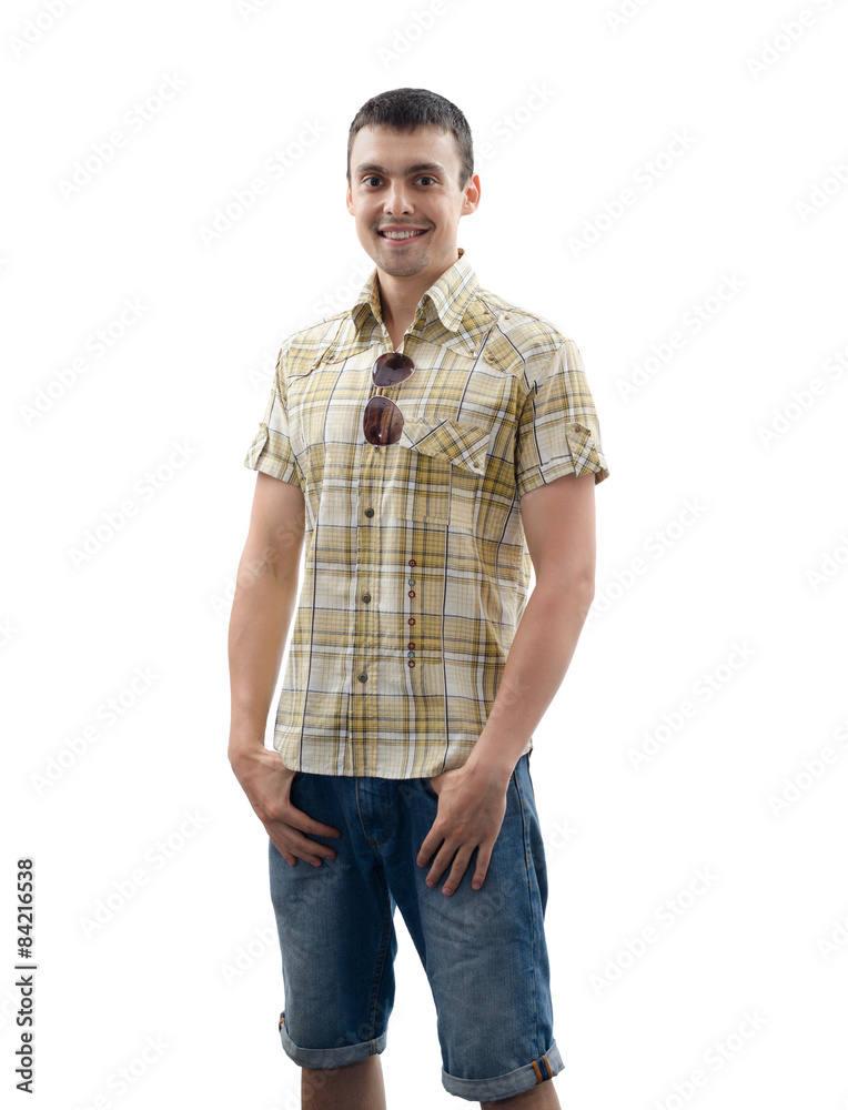 young man in denim shorts and a shirt
