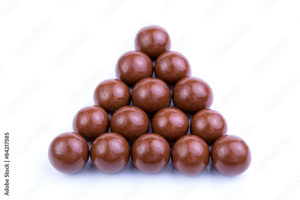 Chocolate candies on a white background. Chocolate candies on a white background.