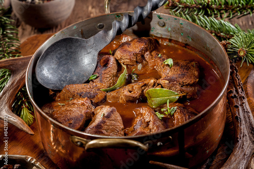 Venison Goulash Stew in Pot with Serving Spoon