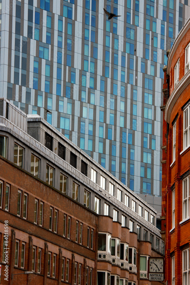 Fototapeta premium Windows set in steel on modern buildings