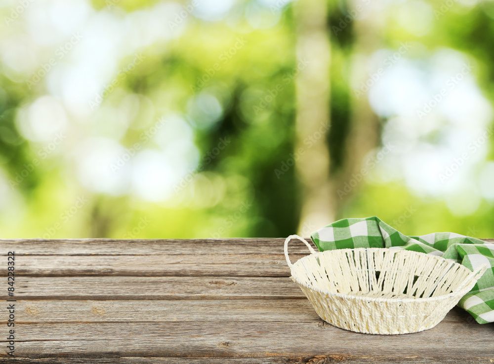 Background with wooden table with basket Background with wooden table with basket