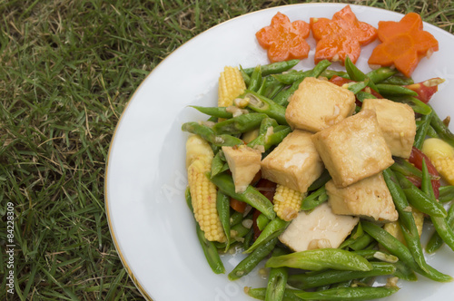 Vegetable and tofu stir-fry dishes. photo