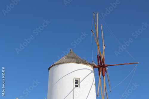 Windmill in Oia village in Santorini island